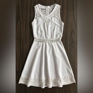 Charlotte Russe A-line mini dress with lace detail; white (size M)